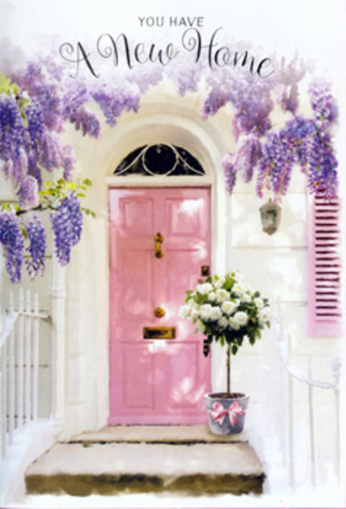 The photograph presents a storybook-style front door in Elmers End, dressed with flowers and light in a way that feels both gentle and jubilant. A pink door, painted in a soft chalk blush with a slightly weathered charm, is set into a whitewashed wall, with a single pastel shutter mirroring its tone and drawing the eye along the façade. Above, lavish clusters of wisteria hang down in tumbling streams of lavender and pale purple, their blossoms dense and textured, suggesting the air is filled with their sweet, powdery scent. On the step just in front of the door, a simple grey metal bucket holds a generous arrangement of white and cream roses. The roses are lush and fully open, revealing curving layers of petals that catch the light like silk. Fresh green foliage peeks between the blooms, adding a touch of movement and colour contrast without disturbing the serene palette. A satin ribbon in the softest pink is tied securely around the bucket, its bow arranged with a florist's precision so that it sits squarely at the front, the ends trailing gracefully onto the stone. The light falls across the scene in gentle strokes, like late afternoon sunshine on an Elmers End terrace facing the quieter backstreets or the paths leading toward Elmers End Green. Everything about the image suggests a housewarming or new-home surprise - perhaps a thoughtful delivery from Elmers End Florist, left carefully at the door to greet the new occupants. The pastel hues, cascading blooms, and classic roses together evoke a deep sense of welcome: a threshold ready to witness hellos, goodbyes, and every everyday moment in between, all starting with the simple joy of flowers waiting by a pink door.