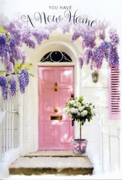 A tranquil entranceway in Elmers End is captured here, bathed in a soft, flattering light that makes every pastel tone sing. The central focus is a delicately painted pink front door, its surface slightly matte so it catches the light in a velvety way, bordered by a whitewashed wall and a matching shutter that echoes the same gentle blush. Overhead, swathes of lavender wisteria descend from above the frame, their clustered blossoms forming loose, fragrant garlands that brush the top of the doorway and spill down toward the step. Resting at the threshold is a tasteful grey bucket, chosen for its understated style, brimming with plush white and cream roses. Each rose has a full, rounded head, the petals folding over each other in soft spirals, with touches of green foliage tucked between them for depth and contrast. Around the base of the bucket is a pale pink ribbon tied in a neat bow, the satin catching just a hint of light and adding a gentle, celebratory detail. The overall atmosphere feels like an Elmers End housewarming moment, perhaps on a residential road near the tram line, where a local florist has arranged a same-day delivery to welcome a family into their new space. Though no people are visible, the scene hums with the anticipation of arrival: the key turning in the lock, the first walk through empty rooms, the quiet joy of spotting a bouquet waiting at the door. Visually, it is a love letter to new beginnings, written in wisteria, roses, and paintwork that glows with understated optimism.